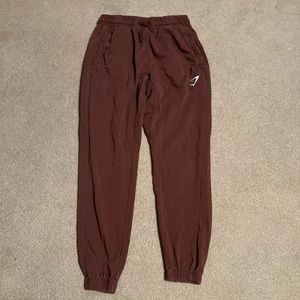 Brown/red Gymshark oversized joggers